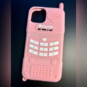 Pink iPhone 14 phone case.